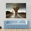 Single elephant walking in a road with the Sun from behind Multi panel canvas wall art