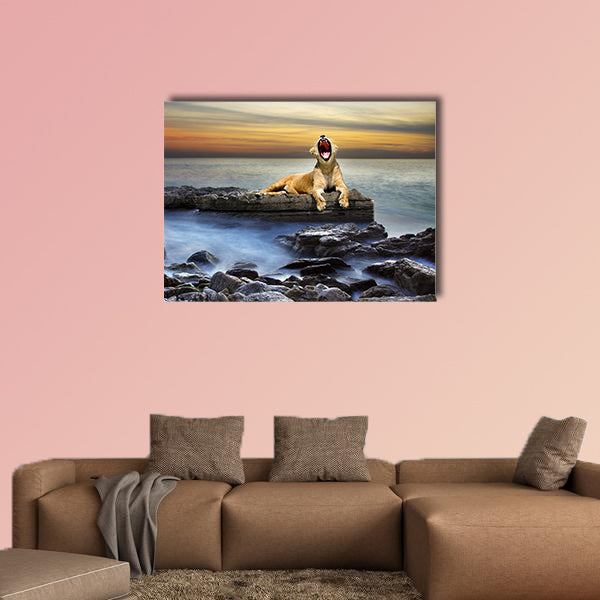 Surreal coastal scene with a lion resting on a rock multi panel canvas wall art