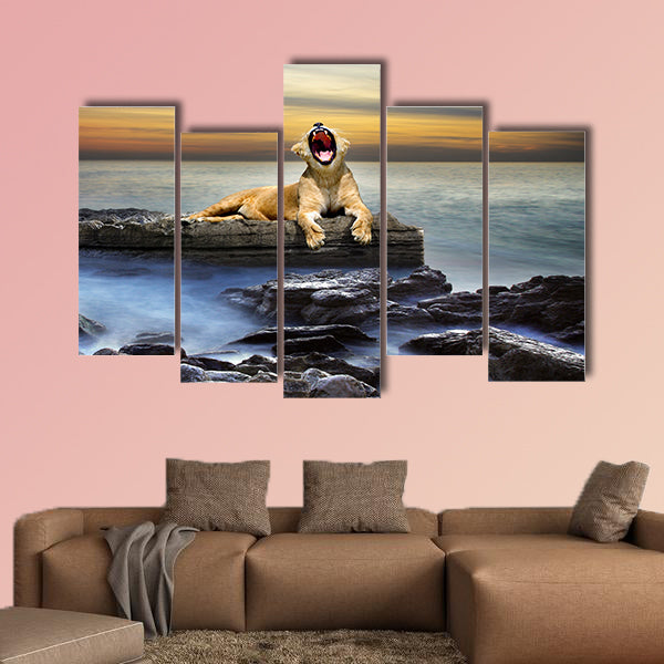 Surreal coastal scene with a lion resting on a rock multi panel canvas wall art