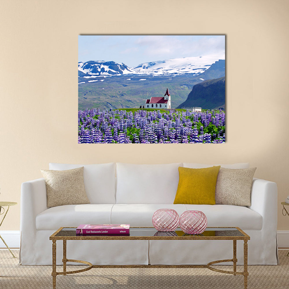 Rural village church surrounded by snow clad mountains multi panel canvas wall art