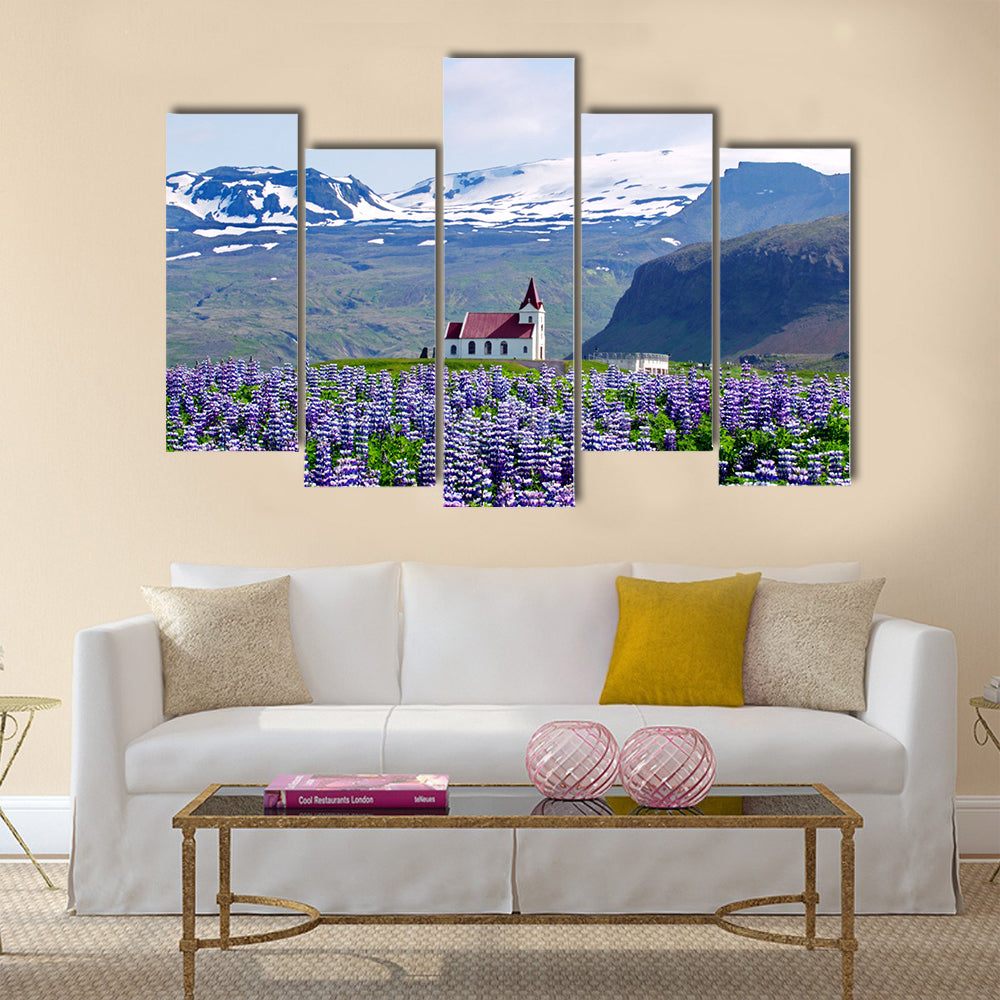 Rural village church surrounded by snow clad mountains multi panel canvas wall art