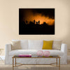 Military silhouettes fighting scene on war fog sky background Multi Panel Canvas Wall Art