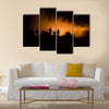 Military silhouettes fighting scene on war fog sky background Multi Panel Canvas Wall Art