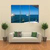 IA Fishing boat in the ocean is engaged in trolling Multi panel canvas wall art