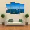 IA Fishing boat in the ocean is engaged in trolling Multi panel canvas wall art