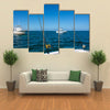 IA Fishing boat in the ocean is engaged in trolling Multi panel canvas wall art