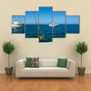 IA Fishing boat in the ocean is engaged in trolling Multi panel canvas wall art