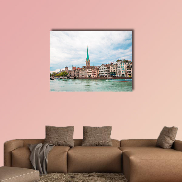 View of the historic city center of Zurich with famous Fraumunster wall art