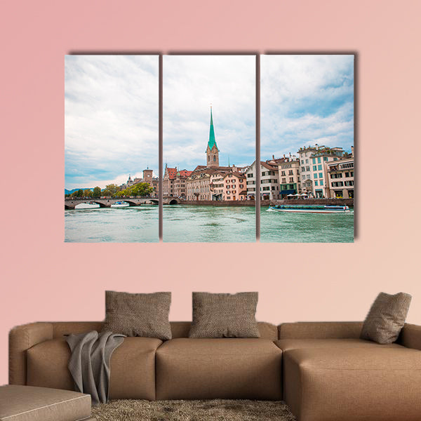 View of the historic city center of Zurich with famous Fraumunster wall art