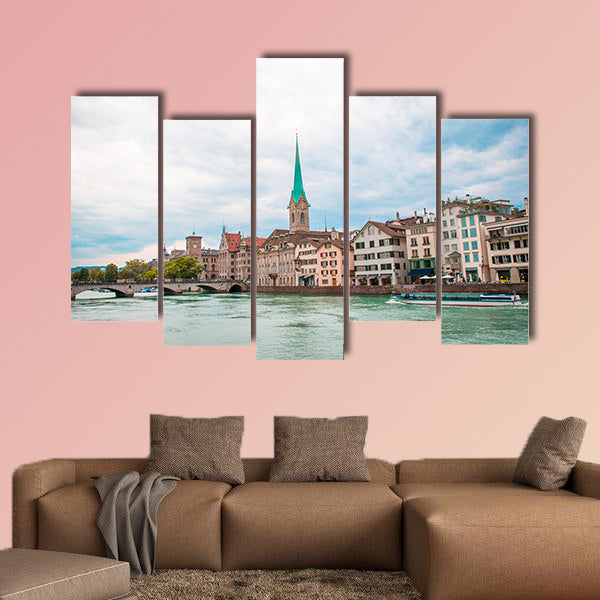 View of the historic city center of Zurich with famous Fraumunster wall art