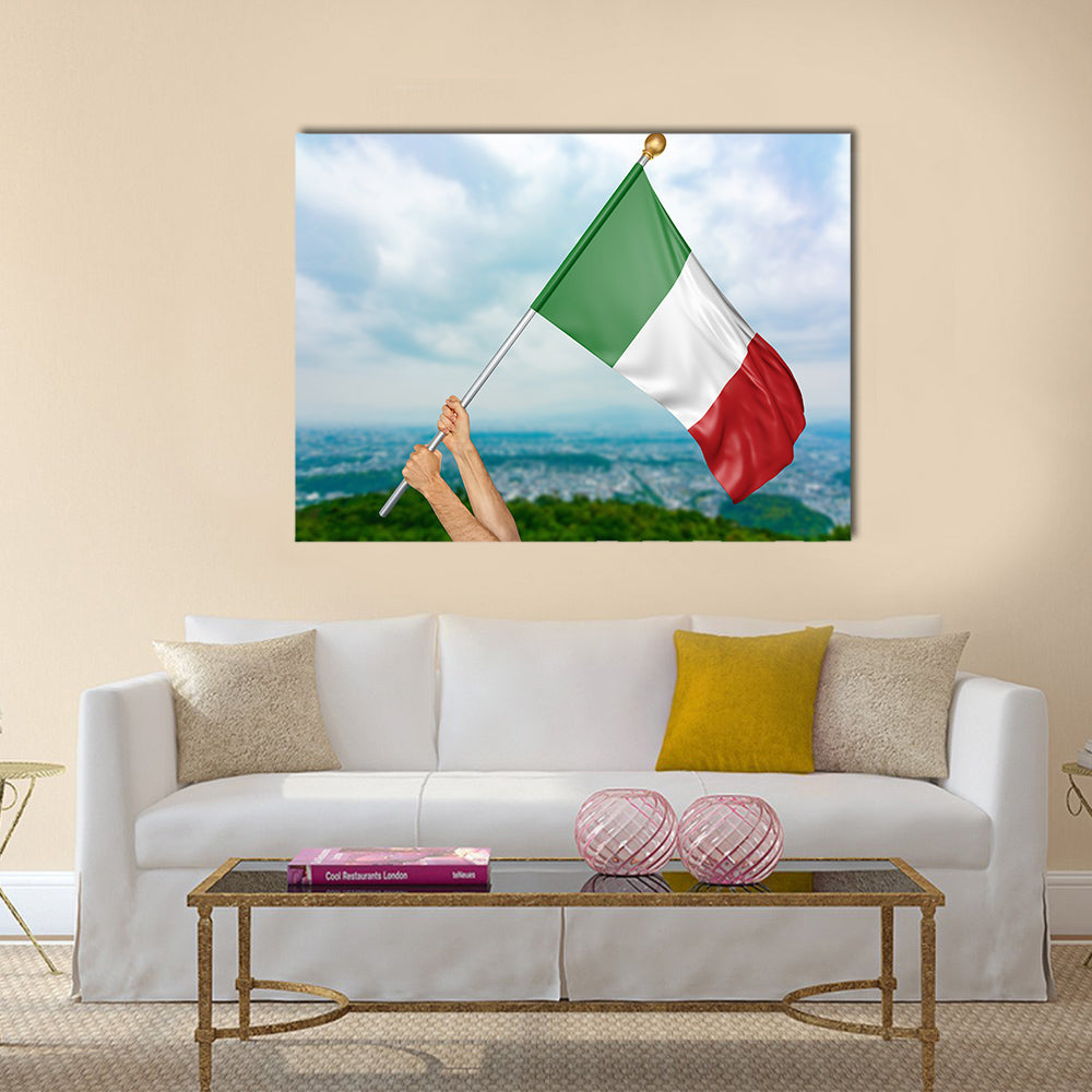 Young man's hands proudly waving the Italy national flag in the sky Multi panel canvas wall art
