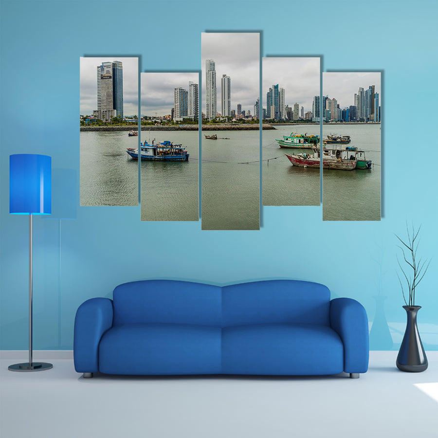 Fishing boats in a port with skyline of the Panama City multi panel canvas wall art