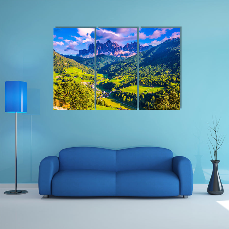 The sun illuminates grandiose crenellated rocks of Tirol, multi panel canvas wall art