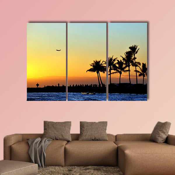 People watch the sunset on the beach Multi panel canvas wall art