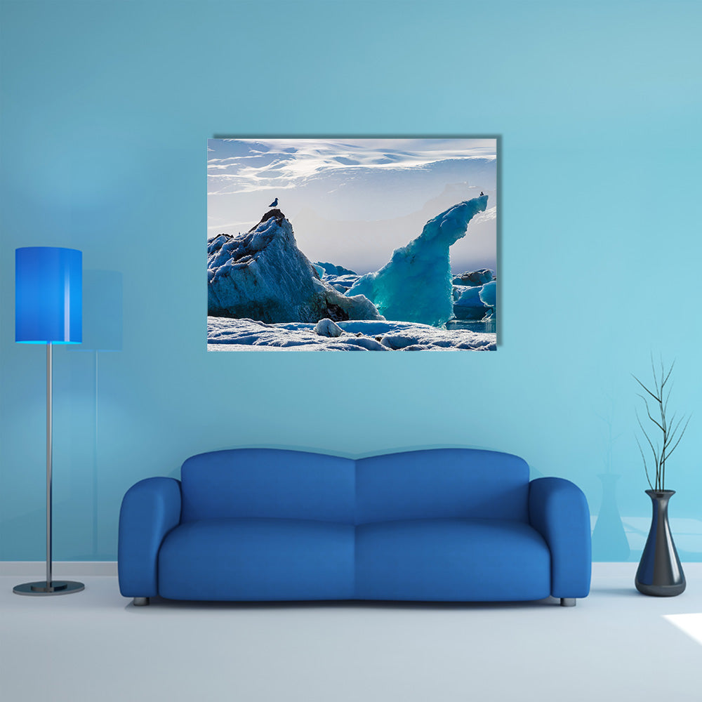Seagulls above floating icebergs in Glacial Lagoon multi panel canvas wall art