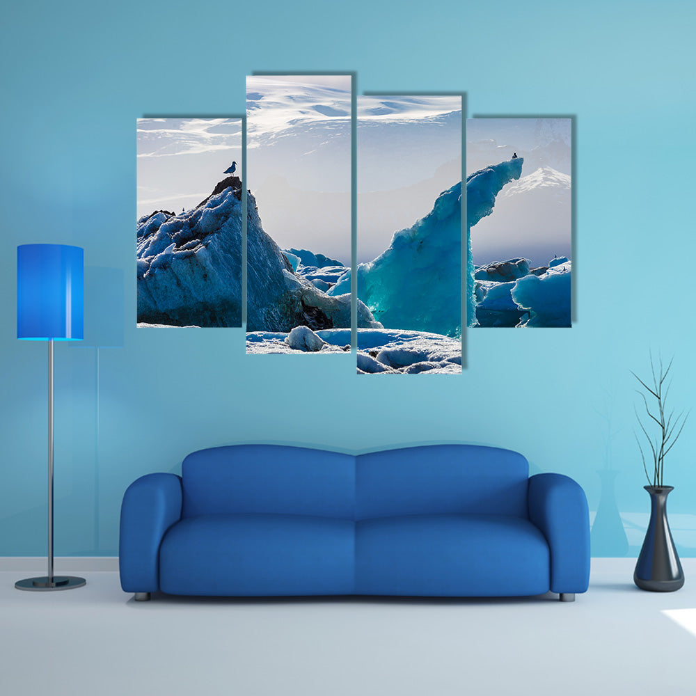 Seagulls above floating icebergs in Glacial Lagoon multi panel canvas wall art