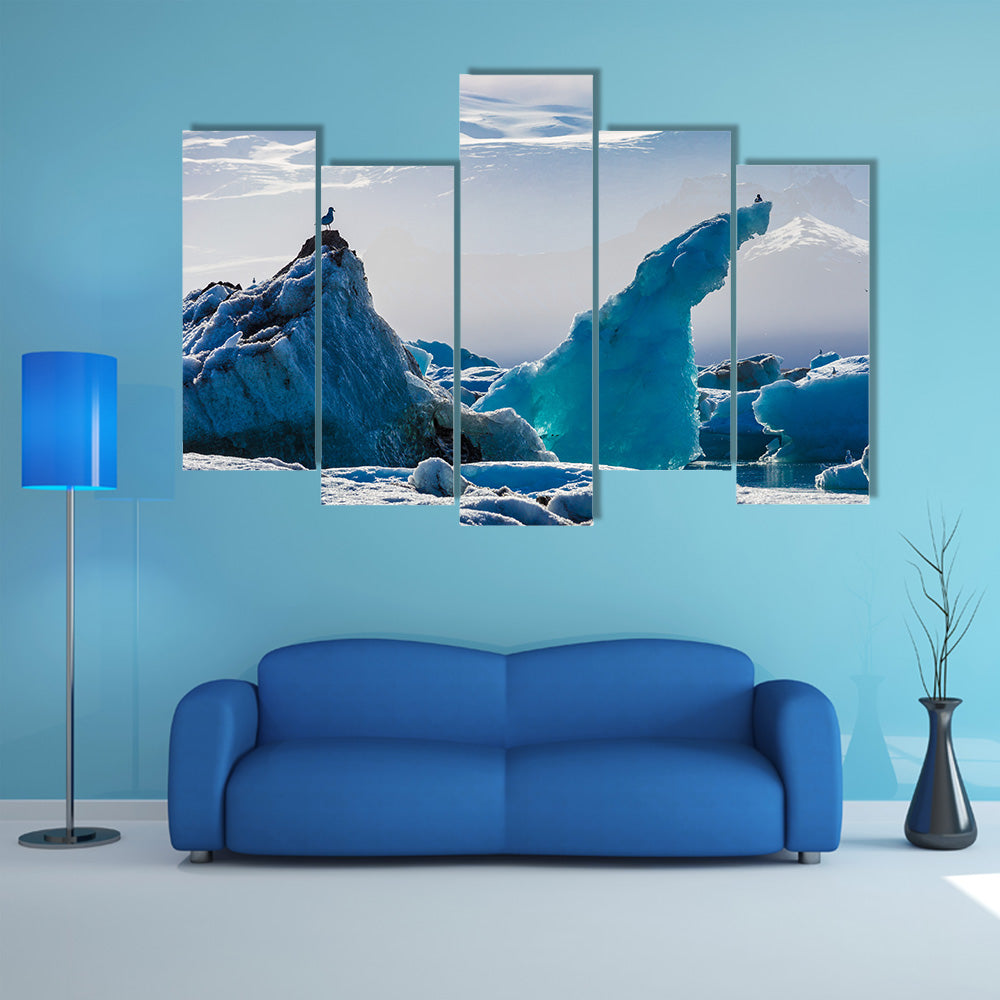 Seagulls above floating icebergs in Glacial Lagoon multi panel canvas wall art