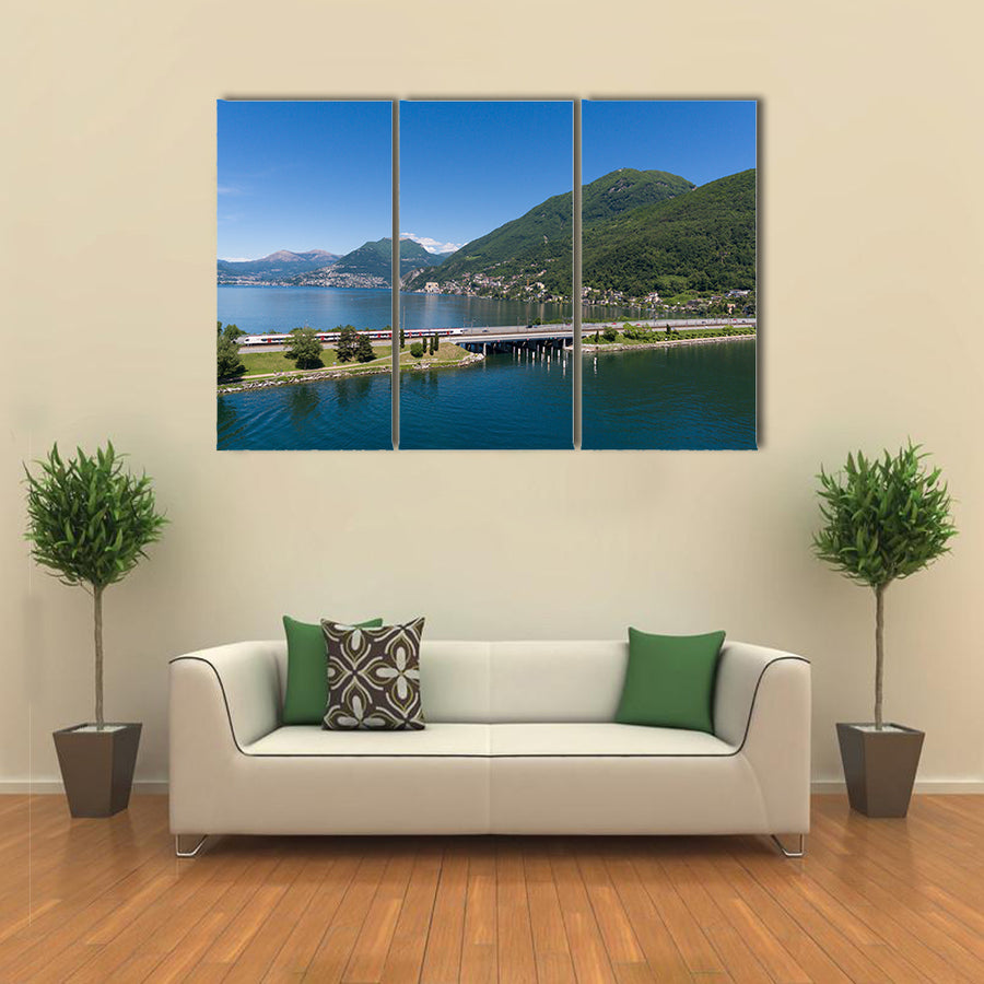 Melide Dam Surrounded By Water Giving A Very Pleasant Scene, Switzerland Multi Panel Canvas Wall Art