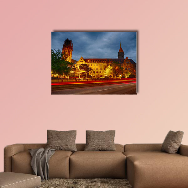 The city hall of Duisburg in Germany at night multi panel canvas wall art
