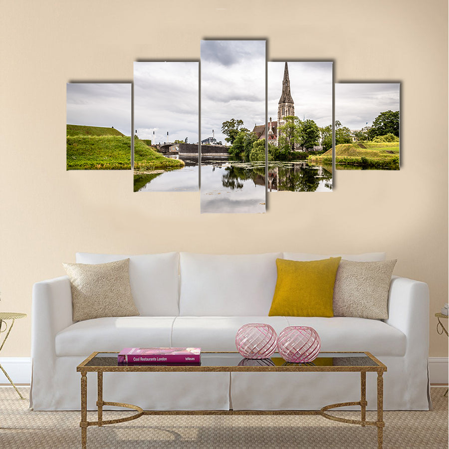 Church reflected on water pond in Churchill Park in Copenhagen a cloudy sunset Multi panel canvas wall art