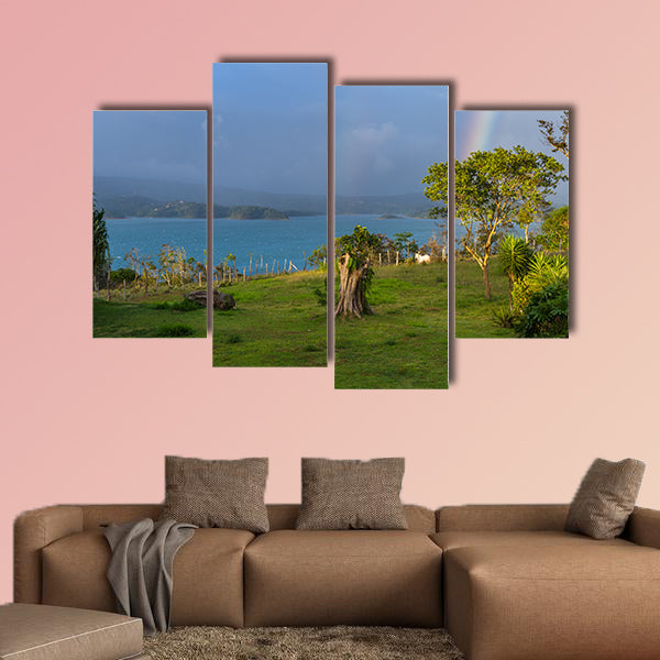 Lake Arenal with a rainbow and sunset light multi panel canvas wall art