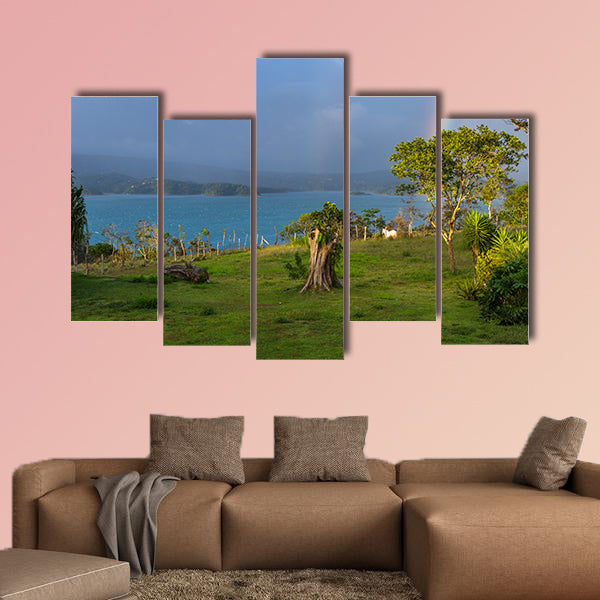 Lake Arenal with a rainbow and sunset light multi panel canvas wall art