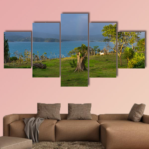 Lake Arenal with a rainbow and sunset light multi panel canvas wall art