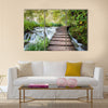 Wooden path along the stream in forest Multi Panel Canvas Wall Art