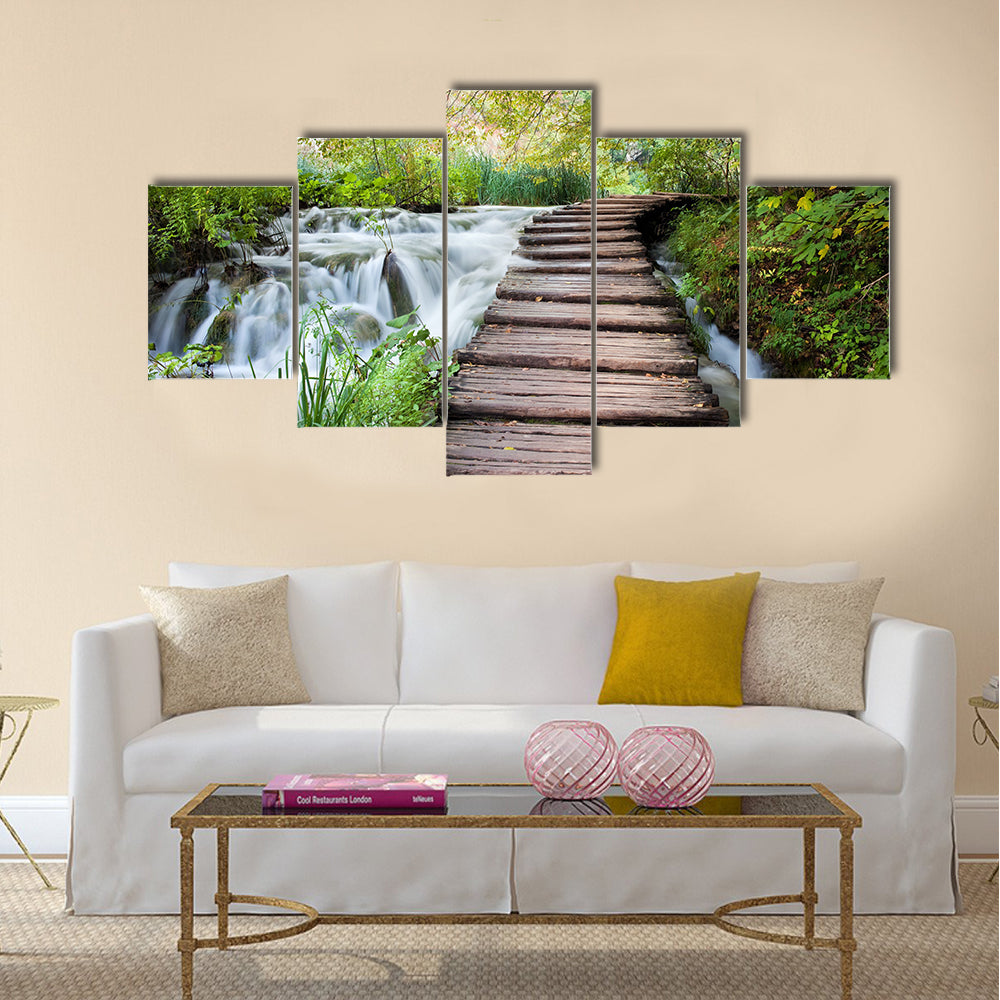 Wooden path along the stream in forest Multi Panel Canvas Wall Art