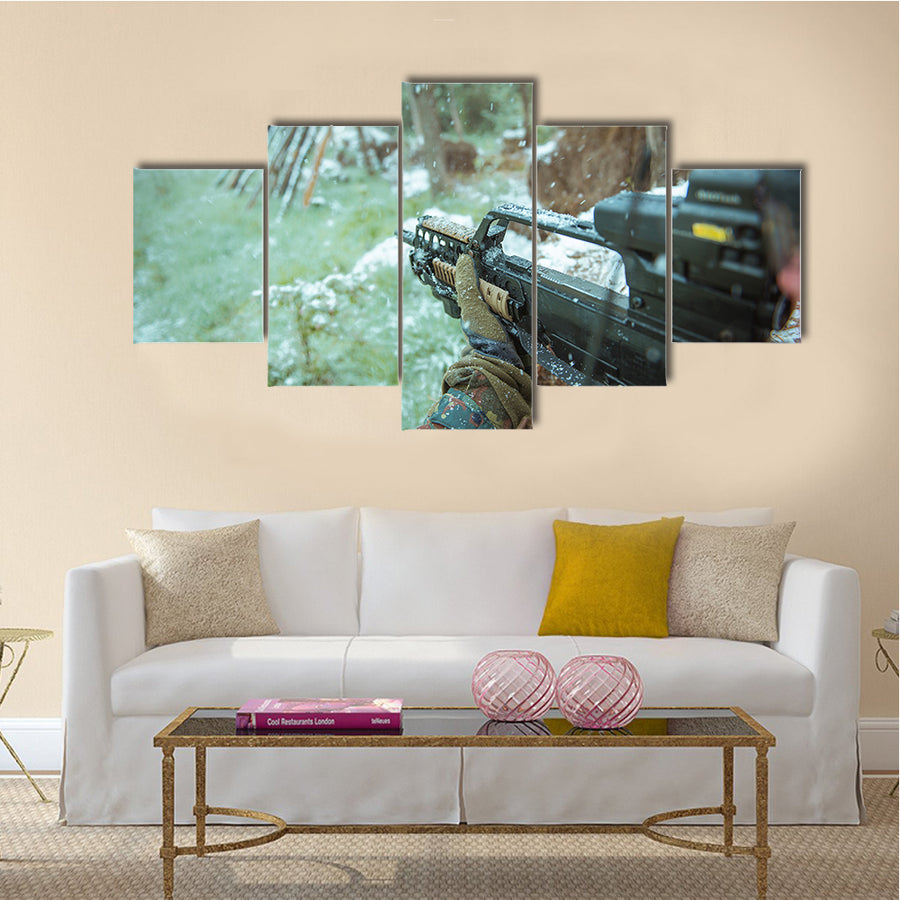 View Of A Sniper Having An Automatic Rifle In His Hand Multi Panel Canvas Wall Art