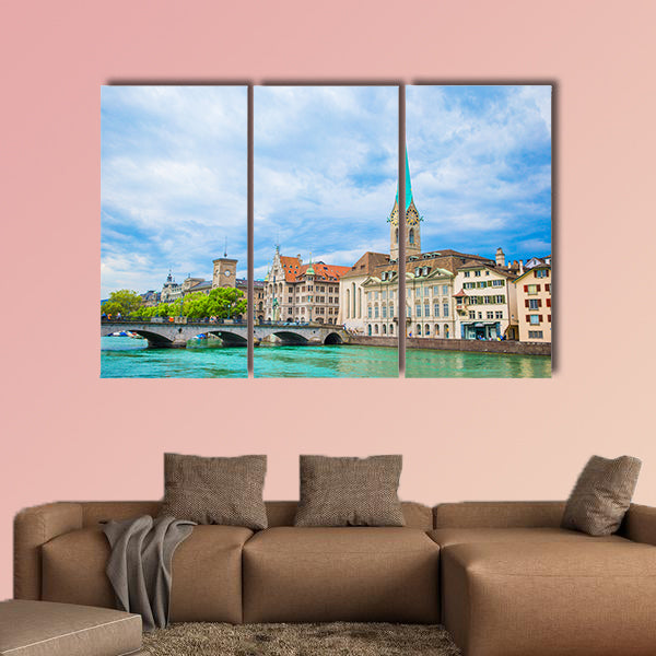 View of the historic city center of Zurich with famous Fraumunster wall art
