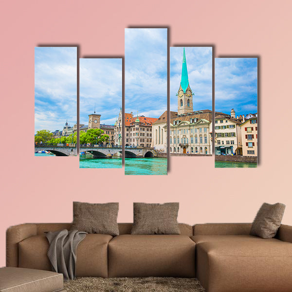 View of the historic city center of Zurich with famous Fraumunster wall art