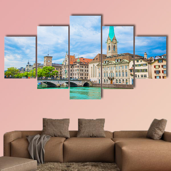 View of the historic city center of Zurich with famous Fraumunster wall art