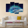 Northern lights aurora borealis over planet Earth northern hemisphere Multi panel canvas wall art