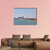 Red and white lighthouse in Cartagena, Spain multi panel canvas wall art