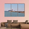 Red and white lighthouse in Cartagena, Spain multi panel canvas wall art