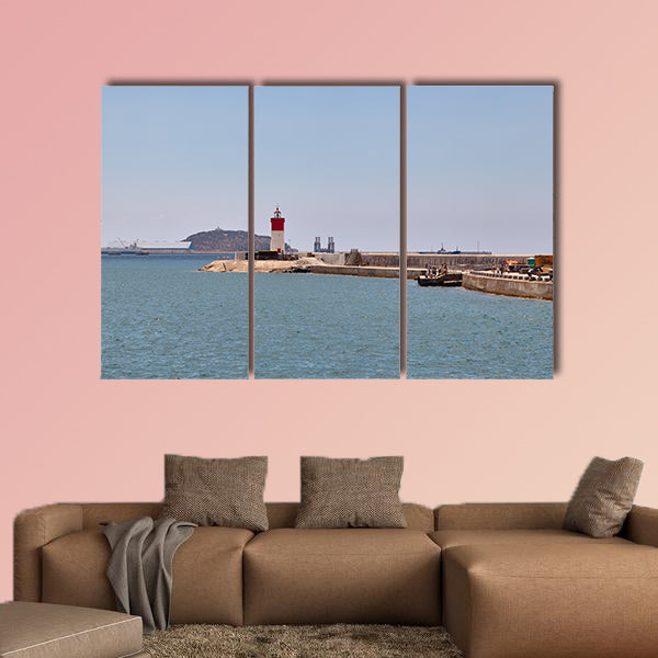 Red and white lighthouse in Cartagena, Spain multi panel canvas wall art