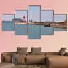 Red and white lighthouse in Cartagena, Spain multi panel canvas wall art