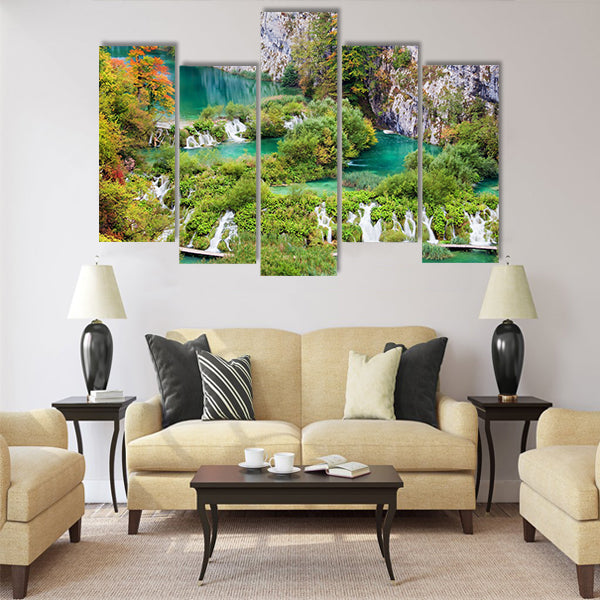 Scenic autumn landscape with numerous waterfalls Multi Panel Canvas Wall Art