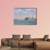 The military area with yellow buildings in Cartagena, Spain multi panel canvas wall art