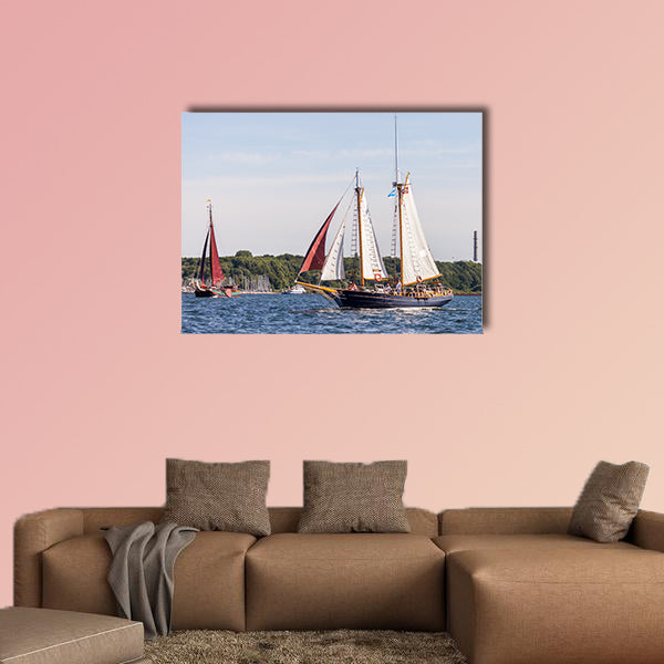 A sailing ship drives in water on public event Kieler Woche wall art