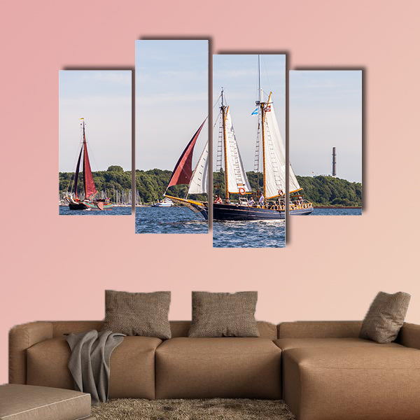 A sailing ship drives in water on public event Kieler Woche wall art