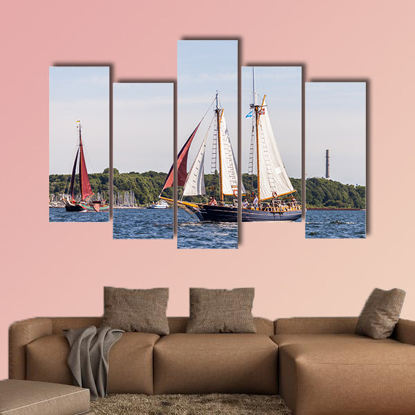 A sailing ship drives in water on public event Kieler Woche wall art