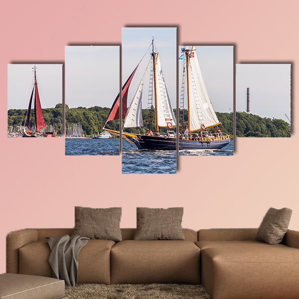 A sailing ship drives in water on public event Kieler Woche wall art