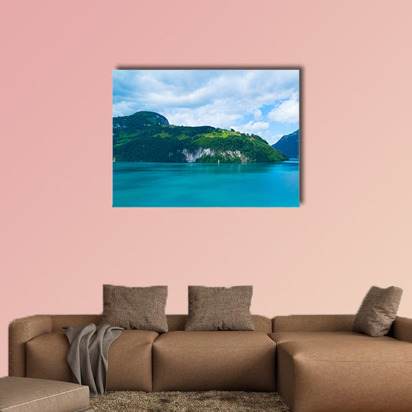 Blue lake and moving reflection of a sunny mountain backdrop wall art