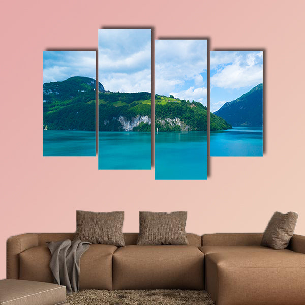 Blue lake and moving reflection of a sunny mountain backdrop wall art