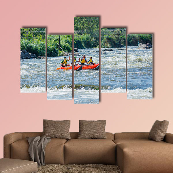 Happy family of four on the catamaran Multi panel canvas wall art