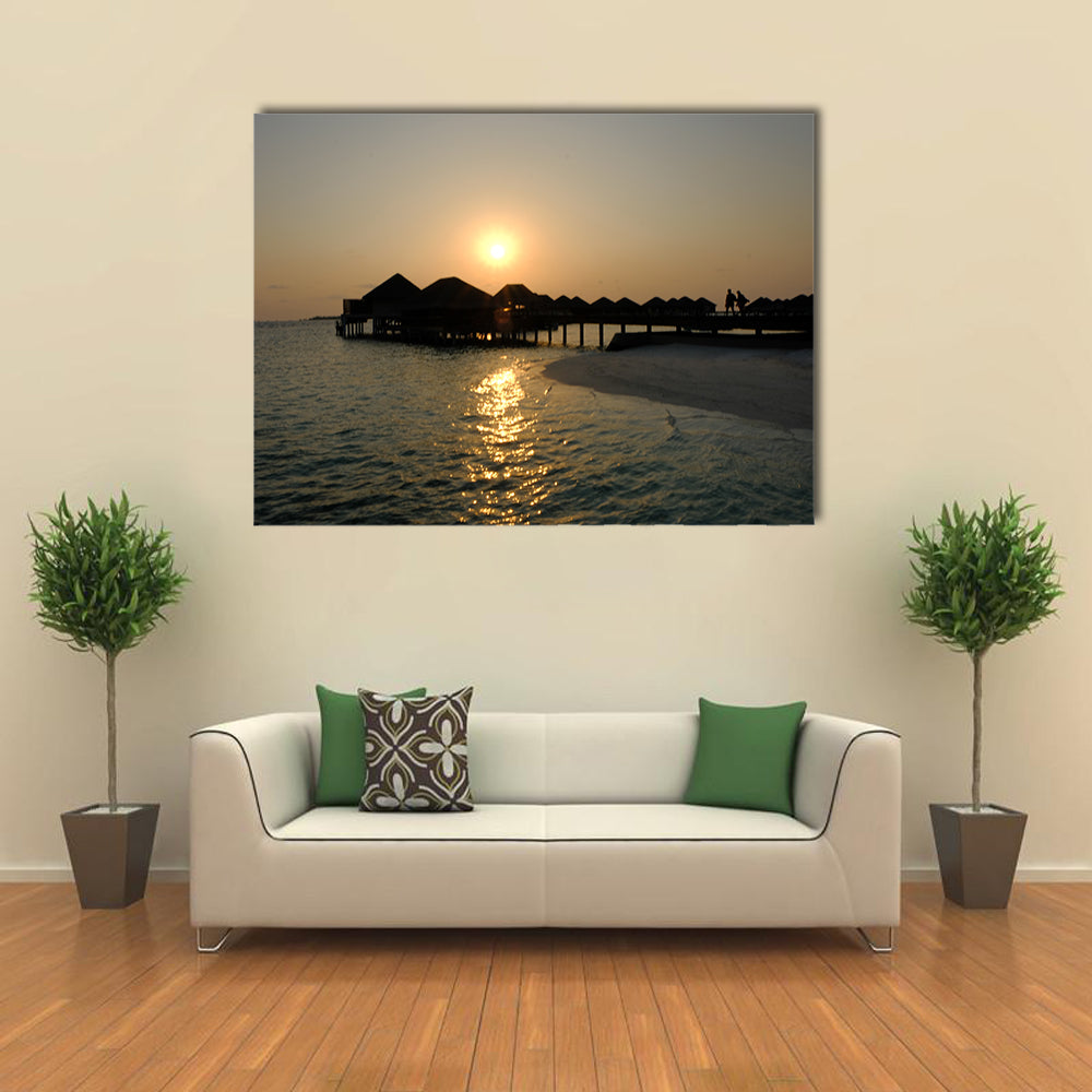 The Romance Of ACouple That EnjoyAn Idyllic Sunset stroll Multi Panel Canvas Wall Art