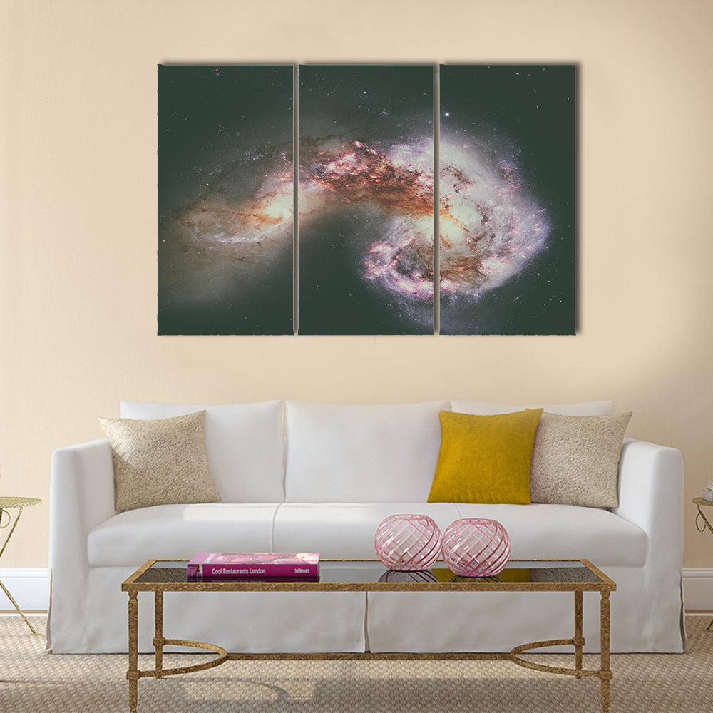 The Antennae Galaxies or NGC 4038 or NGC 4039 are undergoing a galactic collision Multi Panel Canvas Wall Art
