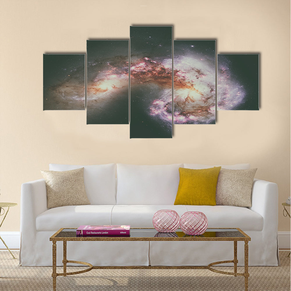 The Antennae Galaxies or NGC 4038 or NGC 4039 are undergoing a galactic collision Multi Panel Canvas Wall Art